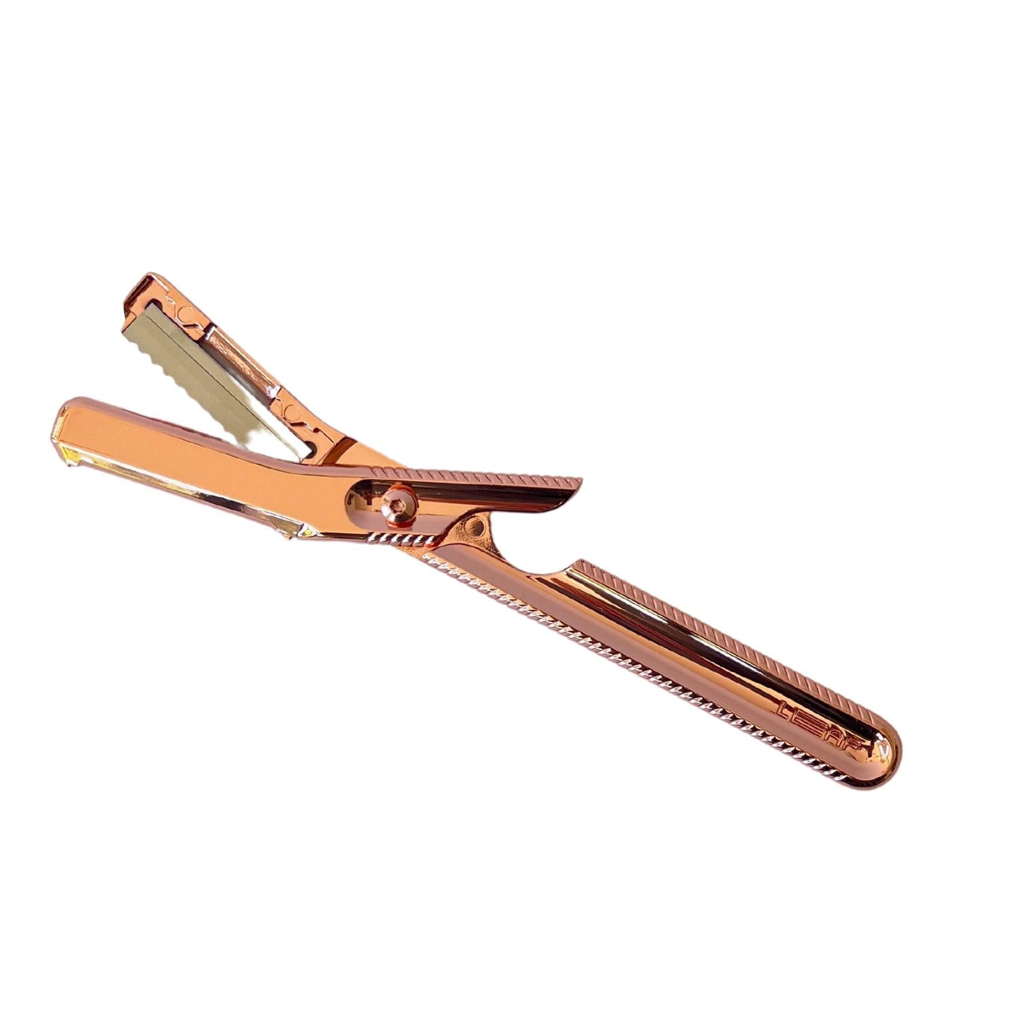 leaf dermaplaner in colour rose gold ideal for removing peach fuzz and deal skin cells
