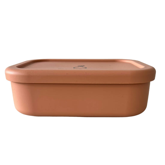 reusable silicone bento lunch boxes made from bpa food grade silicone. apricot colour container with lid on