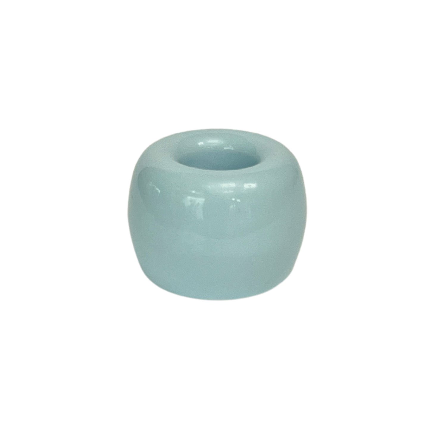 small ceramic toothbrush holder in glossy blue finish