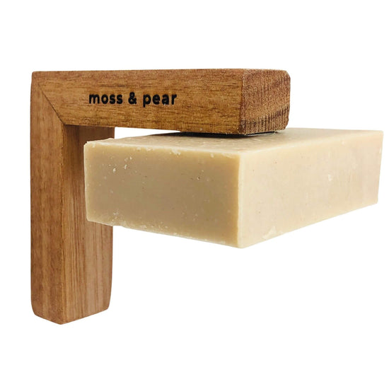 Timber Magnetic Soap Holder made by moss & pear in recycled timber. Moss & pear logo on side. Holder has a soap bar hanging from it by magnet